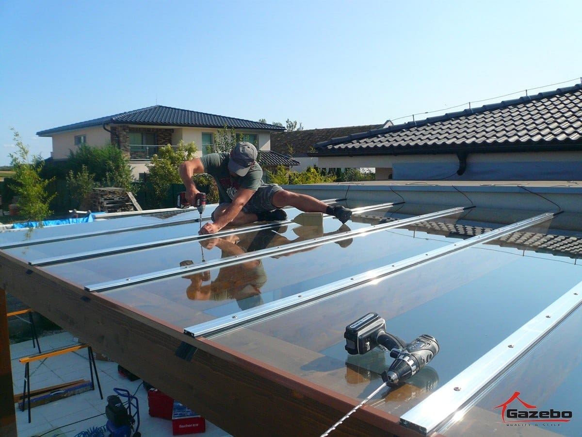 Laying glass onto the Milano wooden pergola