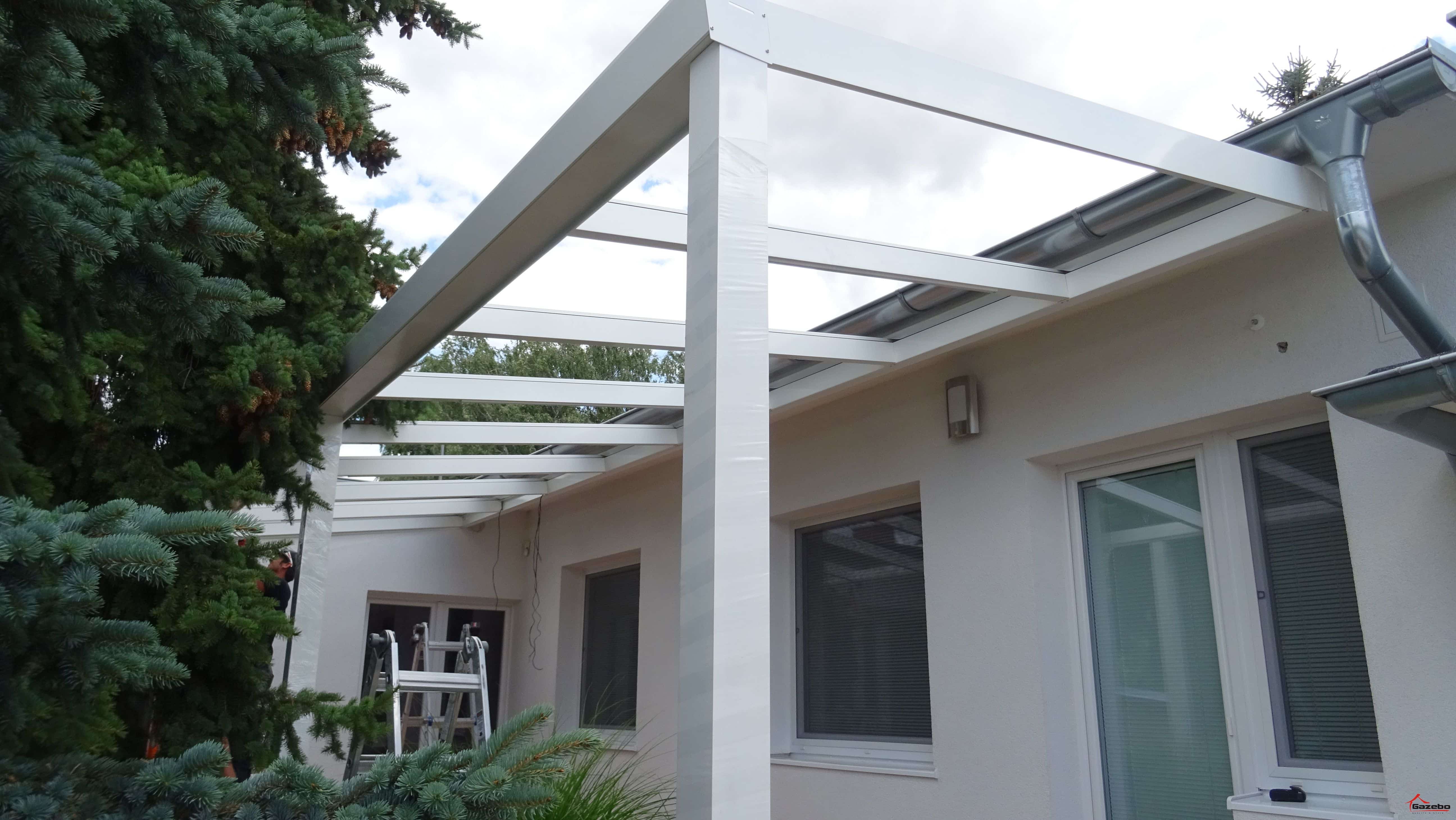 White aluminium pergola during the shelter rebuild