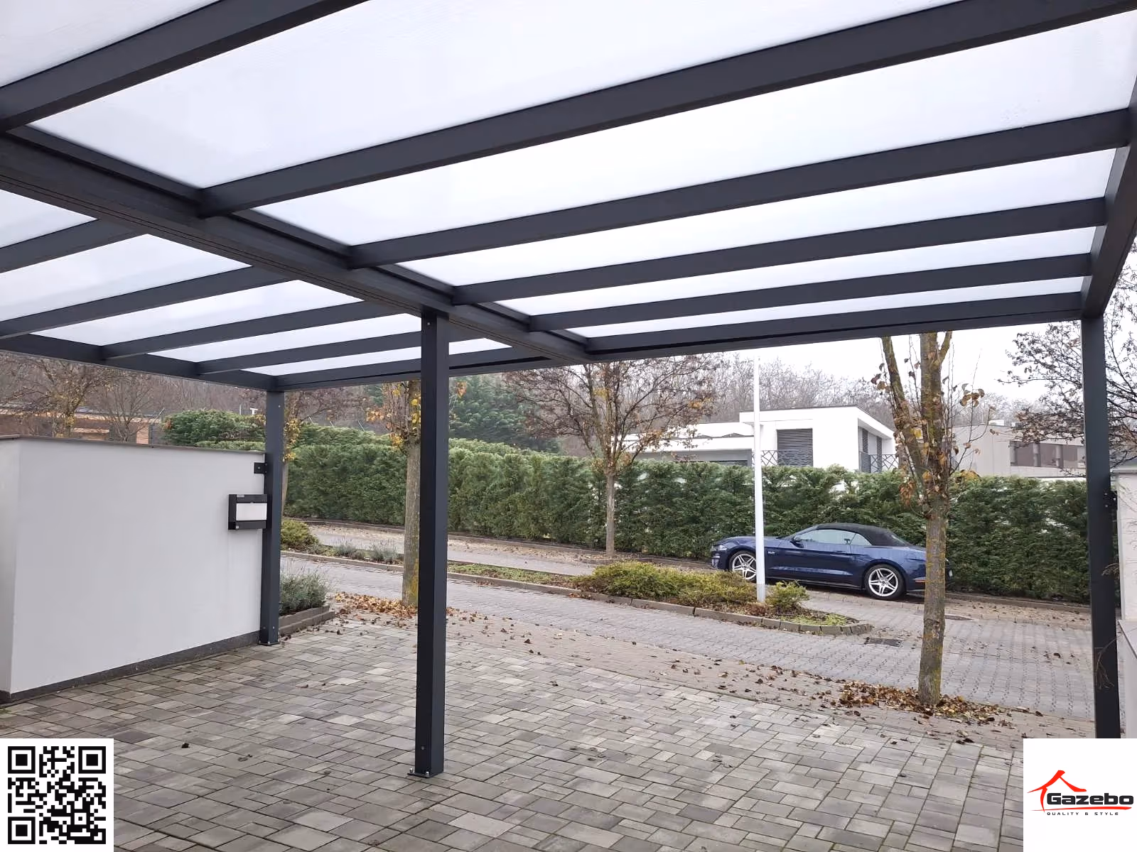 Custom aluminium carport set beside a home driveway