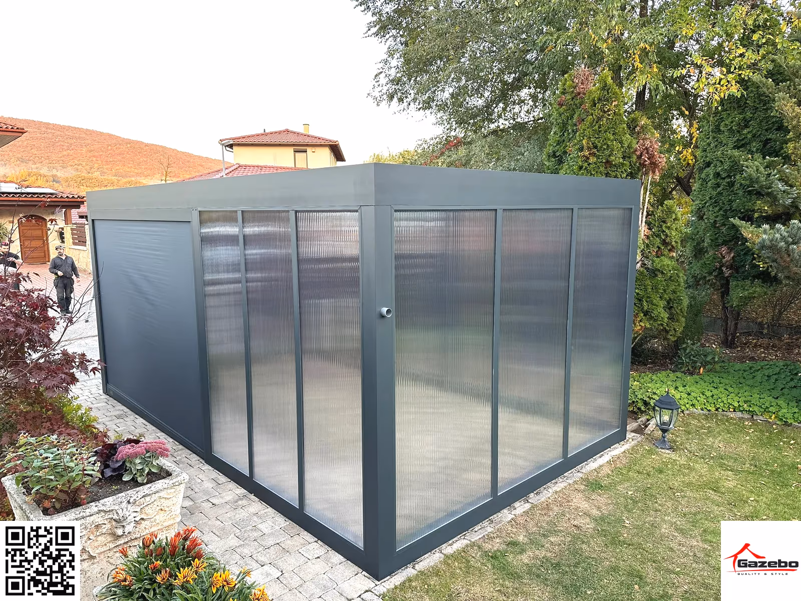Modern white aluminium carport beside a house