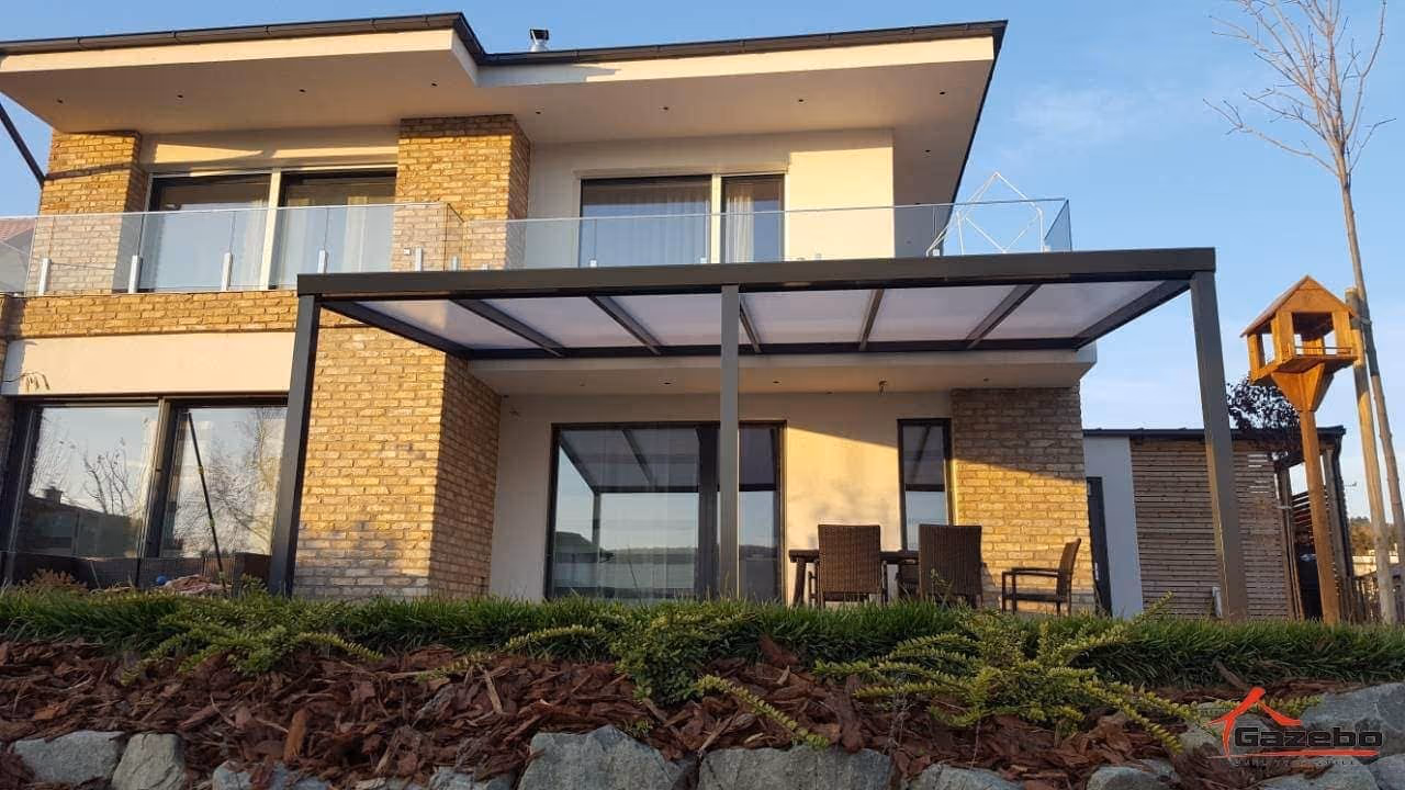 Economic Class aluminium pergola beside a brick family home