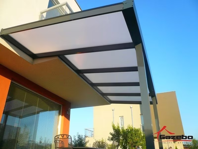 Economic Class aluminium pergola with glazing beside a modern building