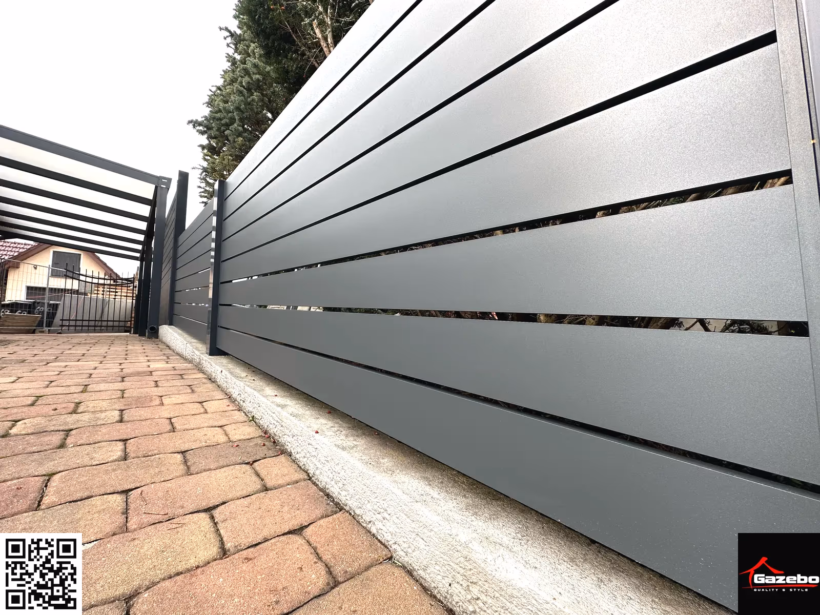 Sliding gate of the modern aluminium fence with a fan-pattern design