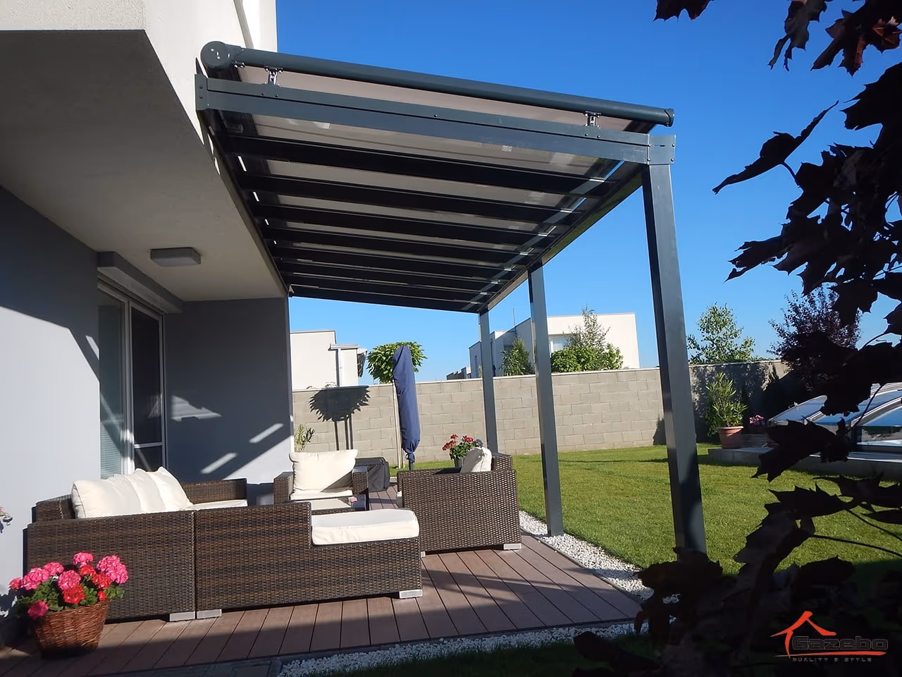 Furnished Top Class aluminium pergola with rattan seating on the terrace