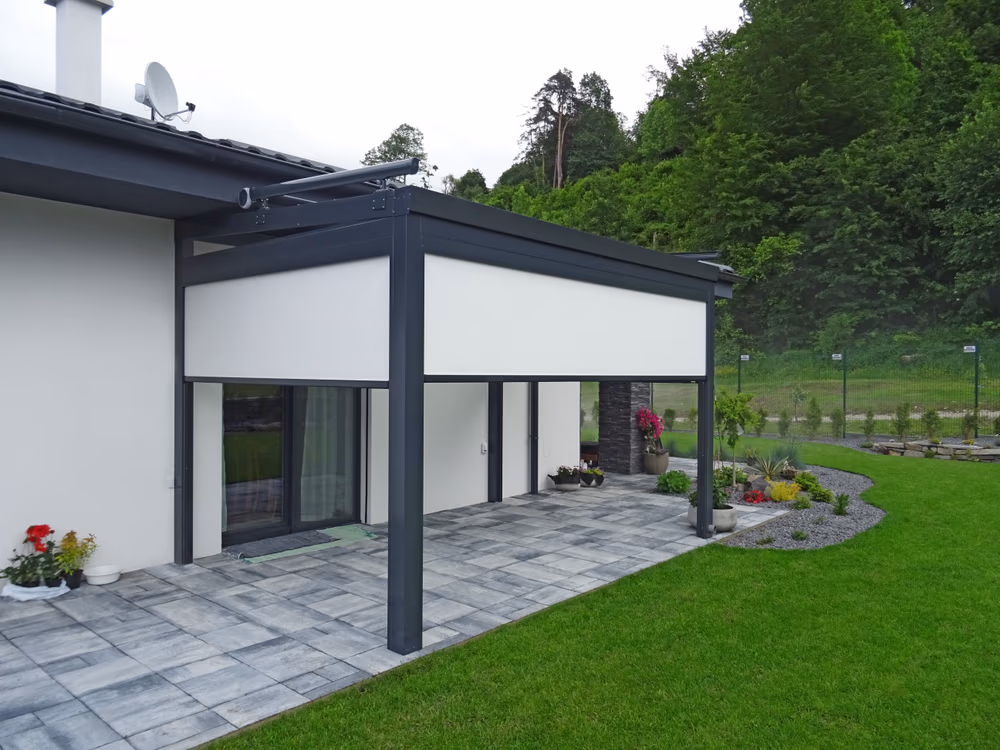 Top Class aluminium pergola with a front electric roller blind