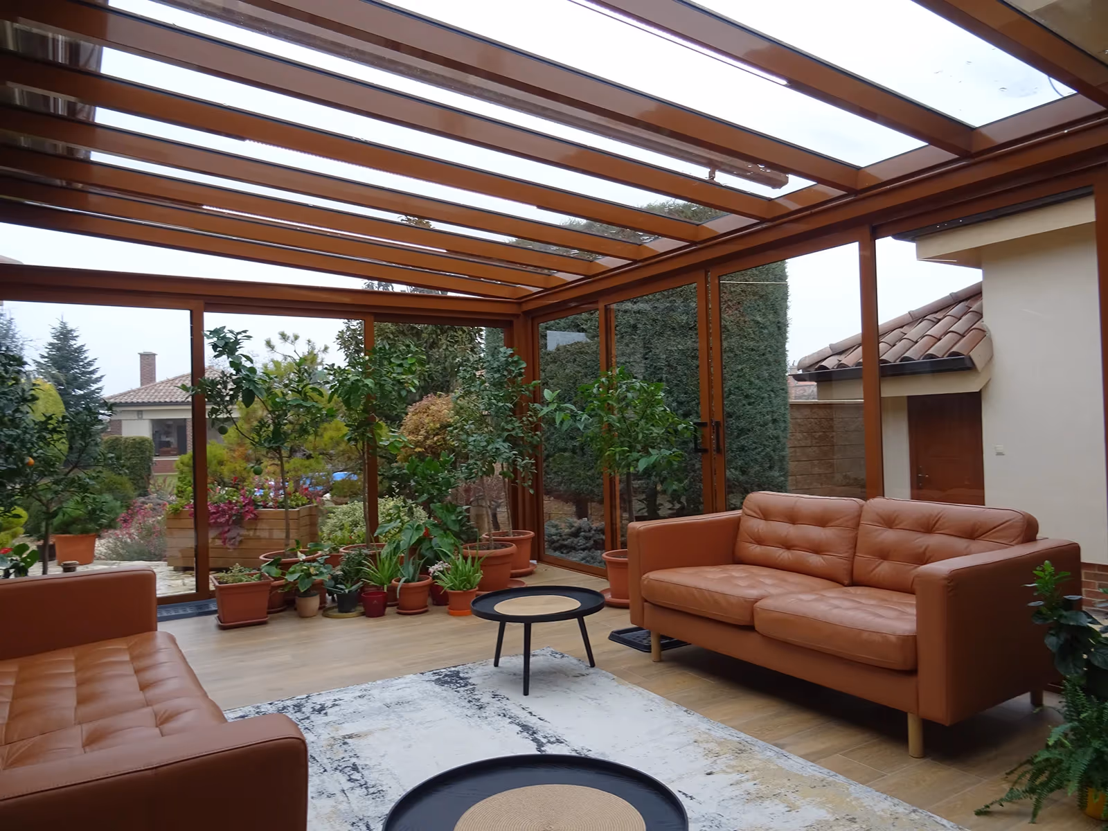 Modern design of the Top Garden 2 aluminium winter garden beside a house