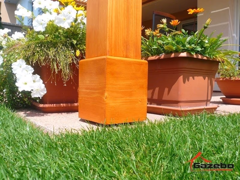 Close-up of the precise CNC machining on the Acapulco wooden pergola with a brass plate
