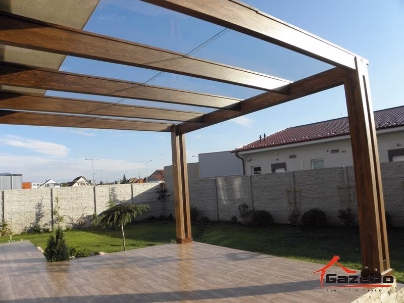 Louvre wooden pergola with a glazed roof letting in daylight