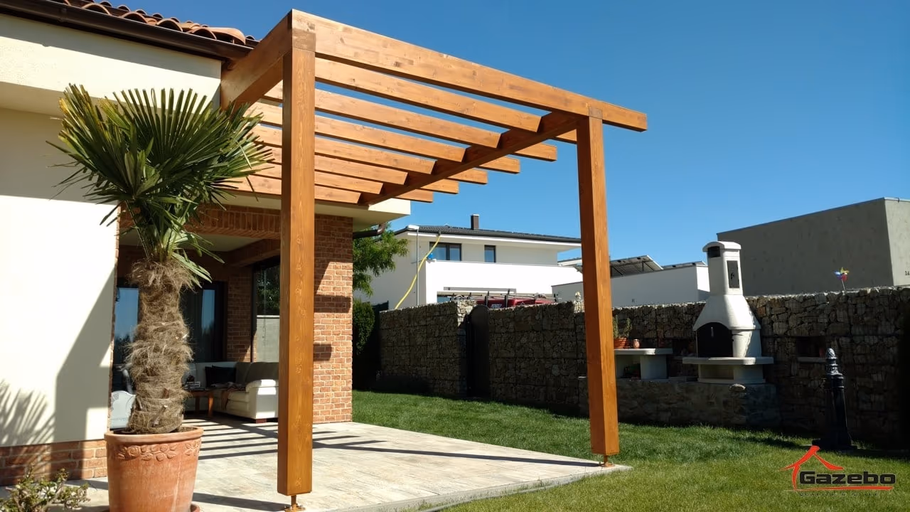 Fenix wooden pergola in glued laminated timber over a terrace